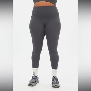 Girlfriend Collective high rise compressive pocket legging size small, moon